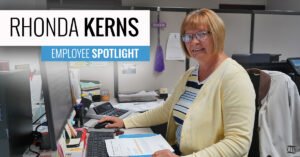 Rhonda Kerns at her desk at CITY's Oelwein location.